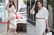 Nora Fatehi sizzles in a thigh-high slit white skirt and crop top